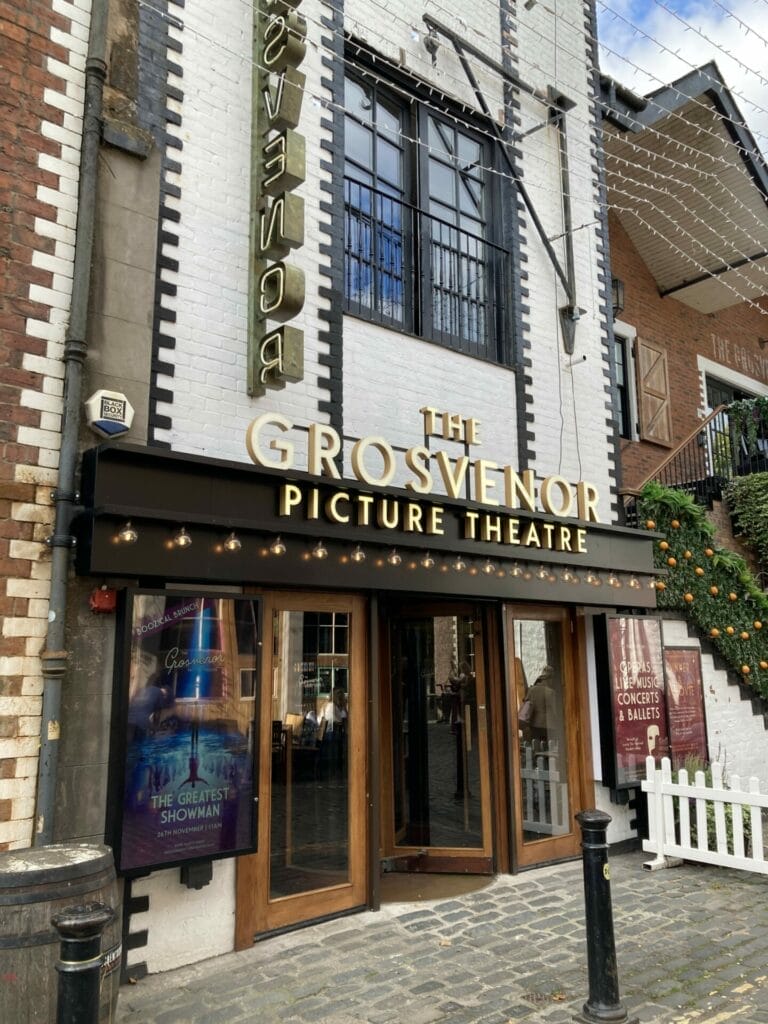 See a movie at the Grosvenor Cinema